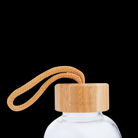 Glazen flessen met bamboe dop